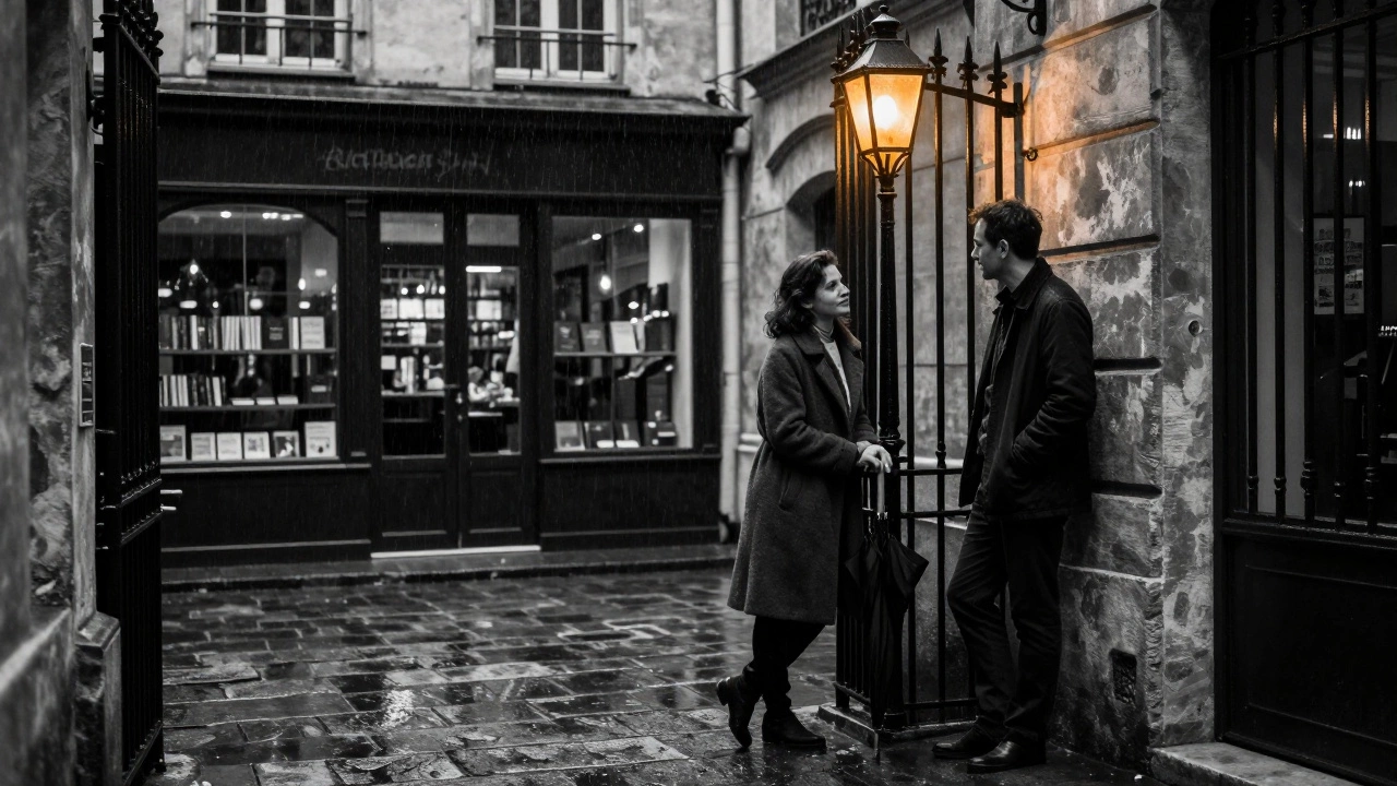 A man and woman converse in a rain-dampened Paris courtyard, lantern light casting soft shadows.